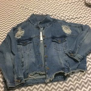 Distressed denim jacket